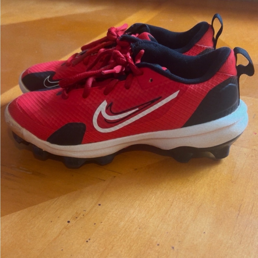 Boys Red and Black Nike Cleats